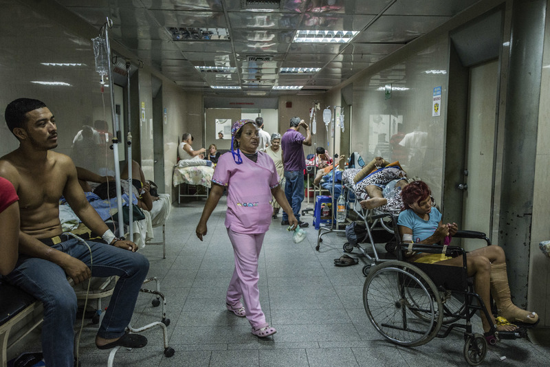 Patients awaiting emergency care fill a hallway at Luis Razetti Hospital in Puerto la Cruz, Venezuela, April 15, 2016. The economic crisis in this country has exploded into a public health emergency, part of a larger unraveling that has become so widespread it has prompted President Nicolas Maduro to impose a state of emergency, raising fears of a government collapse. (Meridith Kohut/The New York Times)